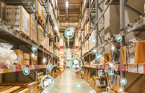 How does IoT improve supply chain management?